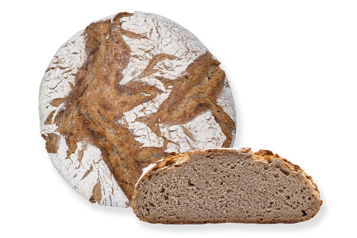 Bergsteigerbrot aus Bioland-Mehl als rustikaler Laib mit Anschnitt – Bio Bäckerei Berger